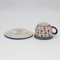 Cup with saucer A44 D139 – hand-painted Bolesławiec pottery with traditional blue-and-white design, elegant for serving coffee and tea.
