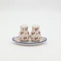 Salt and pepper shakers with tray A12 D141 – hand-painted Bolesławiec pottery in a traditional pattern, an elegant spice set for the table.