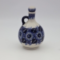 Round bottle carafe from Bolesławiec pottery – an elegant and functional vessel for serving drinks, wine, or water.