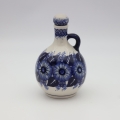 Round bottle carafe from Bolesławiec pottery – an elegant and functional vessel for serving drinks, wine, or water.