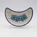 Unique Bolesławiec tray in crescent shape, perfect for serving snacks.