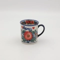 Hand-painted MARS mug with the word MAMA made from traditional Bolesławiec pottery. A perfect gift for moms for everyday use and special occasions.
