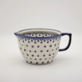 Crafted from thick, durable stoneware, it is perfect for kneading yeast dough, mixing cake batters, whipping creams, or serving family-style meals.