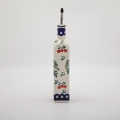 Combine traditional Polish craftsmanship with modern kitchen utility using this square Bolesławiec ceramic oil bottle.