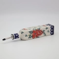 Combine traditional Polish craftsmanship with modern kitchen utility using this square Bolesławiec ceramic oil bottle.