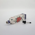 Combine traditional Polish craftsmanship with modern kitchen utility using this square Bolesławiec ceramic oil bottle.