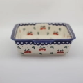 Handcrafted from high-fired stoneware, this casserole dish is engineered for roasting meats, baking pasta dishes, vegetables, and savory pies.