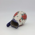 Authentic Polish pottery pitcher from Bolesławiec – perfect for serving water, juice, and milk.