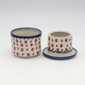 Hand-painted Bolesławiec stoneware butter bell with iconic blue and white folk art motifs.