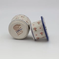 Hand-painted Bolesławiec stoneware butter bell with iconic blue and white folk art motifs.