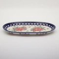 Authentic Polish pottery oval platter from Bolesławiec – perfect for serving appetizers, meats, and side dishes.