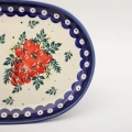 Authentic Polish pottery oval platter from Bolesławiec – perfect for serving appetizers, meats, and side dishes.