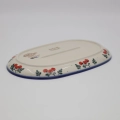 Authentic Polish pottery oval platter from Bolesławiec – perfect for serving appetizers, meats, and side dishes.