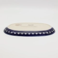 Authentic Polish pottery oval platter from Bolesławiec – perfect for serving appetizers, meats, and side dishes.