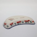 Durable, oven-safe, and dishwasher-safe Bolesławiec ceramic crescent tray for daily use.