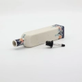 Handcrafted Bolesławiec ceramic bottle with red tomato pattern.