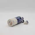 Handcrafted Bolesławiec ceramic bottle.
