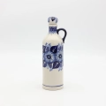 Handcrafted Bolesławiec ceramic bottle.