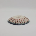 Hand-painted traditional stamped pattern on authentic Bolesławiec stoneware bowl.