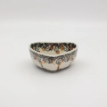 Heart-shaped Bolesławiec ceramic bowl.