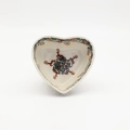 Heart-shaped Bolesławiec ceramic bowl.