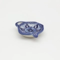 Handcrafted Bolesławiec ceramic tea bag holder with traditional hand-painted pattern.
