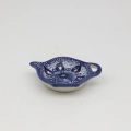 Handcrafted Bolesławiec ceramic tea bag holder with traditional hand-painted pattern.