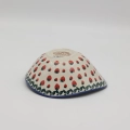 Handcrafted Bolesławiec ceramic bowl with traditional hand-painted pattern.