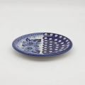 Handcrafted Bolesławiec ceramic dessert plate with traditional hand-painted pattern.