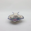 Handcrafted Bolesławiec ceramic baking dish with traditional hand-painted pattern.