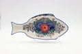 Handcrafted Bolesławiec ceramic baking dish with traditional hand-painted pattern.