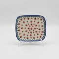 Handcrafted rectangular Bolesławiec ceramic platter with traditional hand-painted pattern.