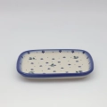 Handcrafted rectangular Bolesławiec ceramic platter with traditional hand-painted pattern.
