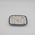 Handcrafted rectangular Bolesławiec ceramic platter with traditional hand-painted pattern.