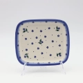 Handcrafted rectangular Bolesławiec ceramic platter with traditional hand-painted pattern.