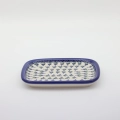 Handcrafted rectangular Bolesławiec ceramic platter with traditional hand-painted pattern.
