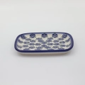 Handcrafted rectangular Bolesławiec ceramic platter with traditional hand-painted pattern.