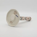 Handcrafted Bolesławiec ceramic paper towel holder.