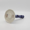 Handcrafted Bolesławiec ceramic paper towel holder.