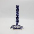 Handcrafted Bolesławiec ceramic paper towel holder.