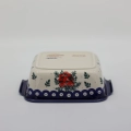 Small square ceramic dish ANDY featuring a vibrant hand-painted pattern.