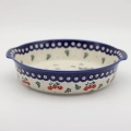 Round ceramic serving dish with handles, perfect for baked meals, snacks, and appetizers.