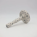 Ceramic paper towel holder featuring a vibrant hand-painted pattern.