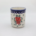 Large ceramic kitchen utensil holder featuring a vibrant hand-painted pattern.