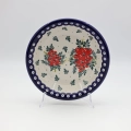 Deep soup plate ANDY 22.5 cm featuring a vibrant hand-painted ceramic pattern.
