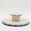 Decorative stoneware cake server showcasing classic Polish pottery craftsmanship.