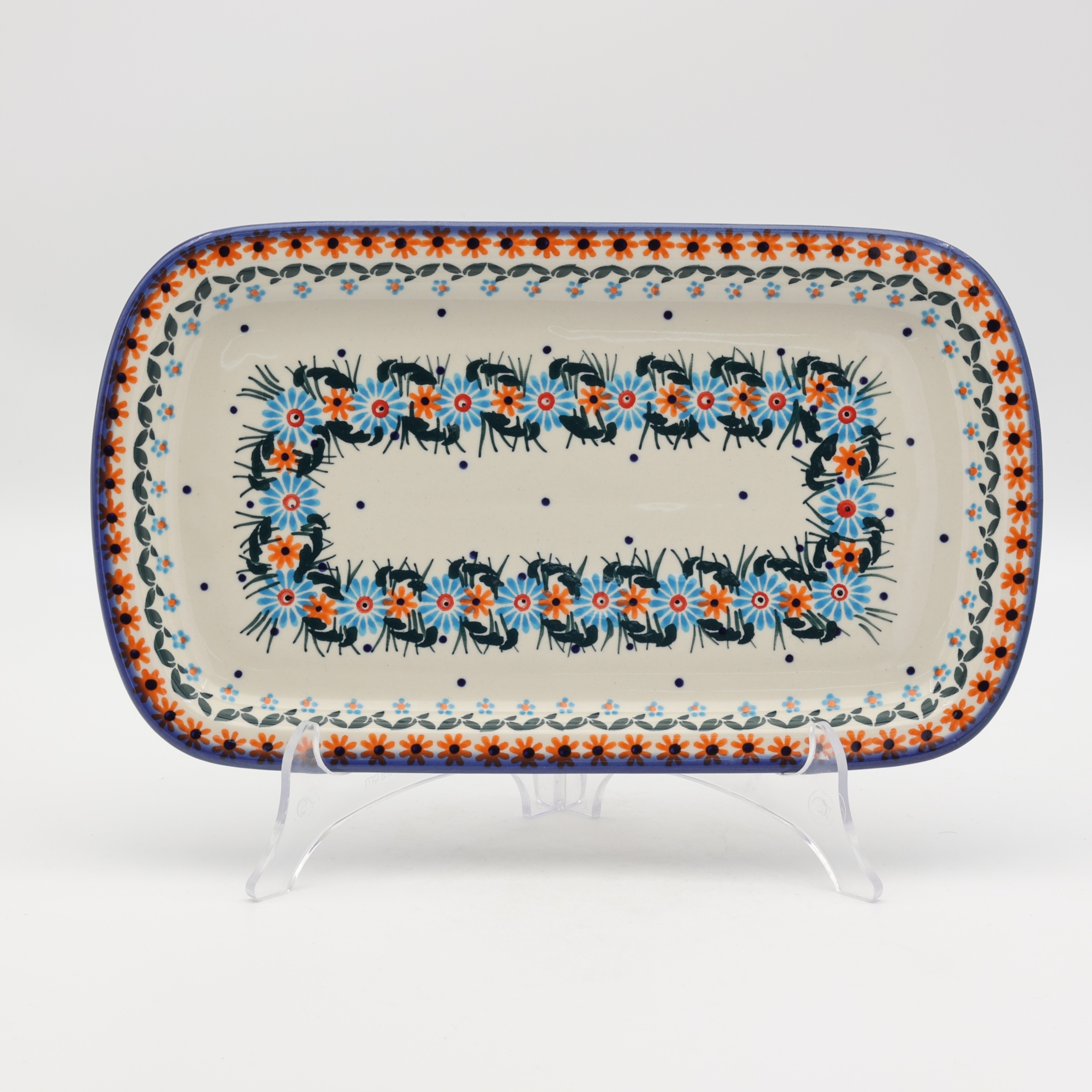 Hand-painted ceramic serving platter made from traditional Bolesławiec pottery. Perfect for serving food and decorating the table.