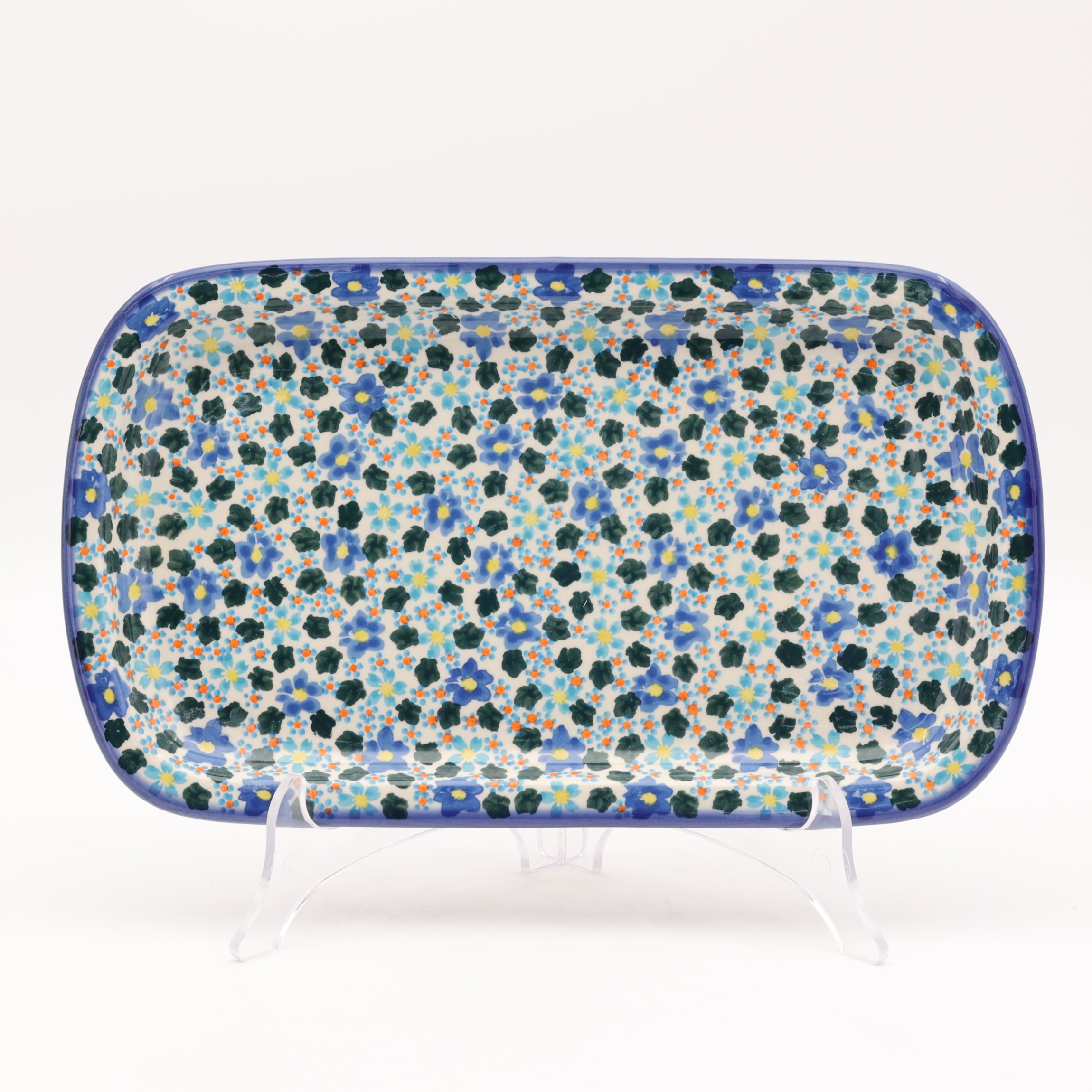 Hand-painted ceramic serving platter made from traditional Bolesławiec pottery. Perfect for serving food and decorating the table.