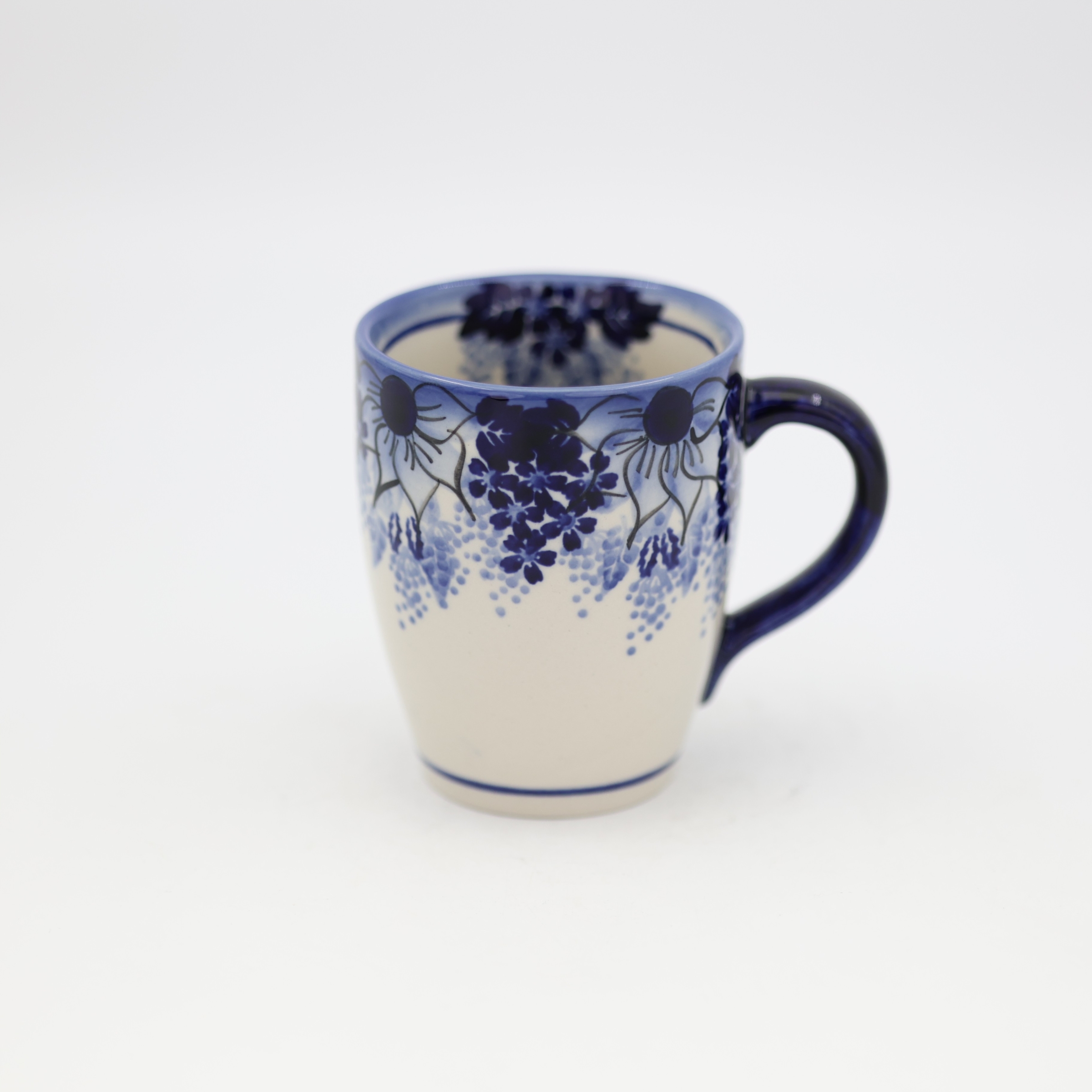 Authentic Polish Pottery: 100% hand-painted and stamped by artisans in Bolesławiec, Poland.