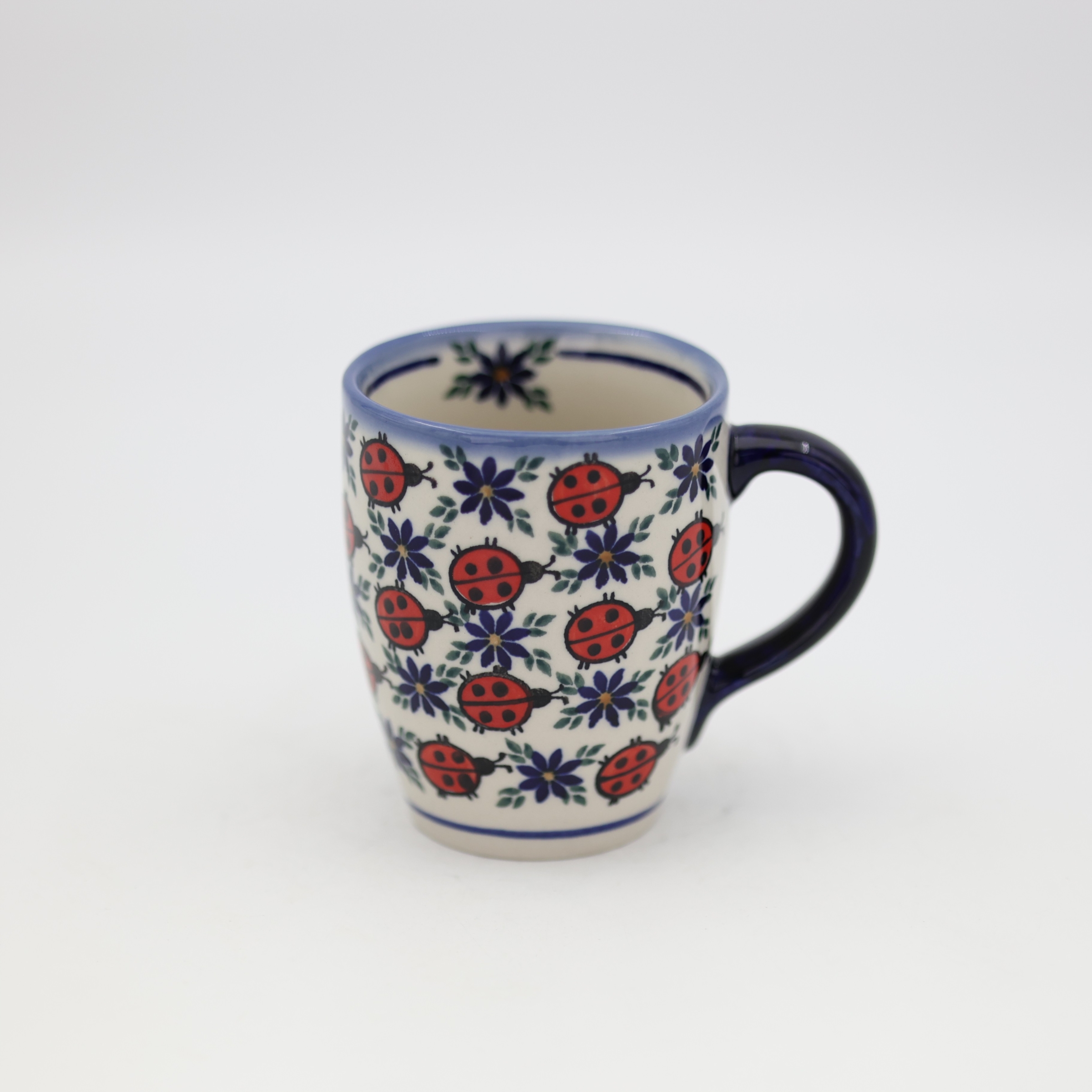 Authentic Polish Pottery: 100% hand-painted and stamped by artisans in Bolesławiec, Poland.